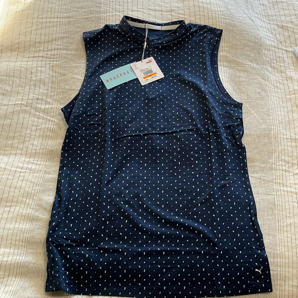 Puma golf sleeveless top. 1/4 zip. Blue and white dot.
